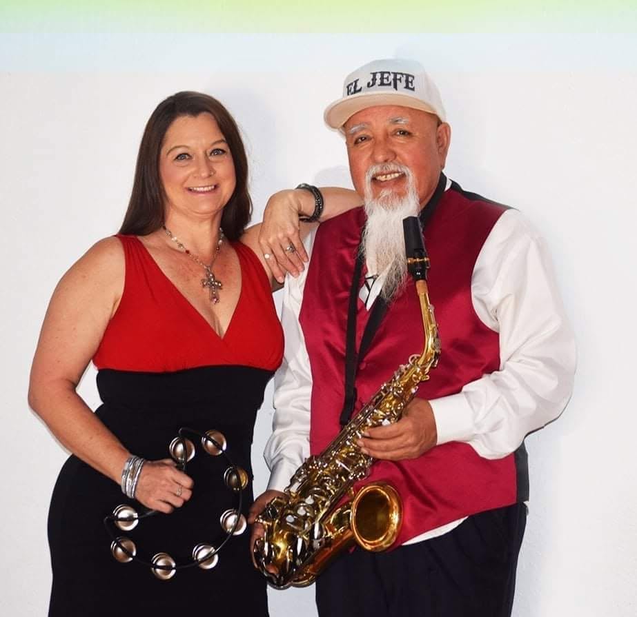 Leather & Lace duo — Laurie with tambourine and Raul with saxophone
