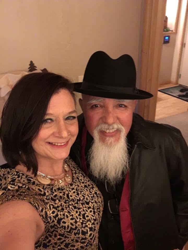 Laurie and Raul dressed for a formal evening performance